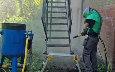 fire escape sandblasting and repainting Manchester